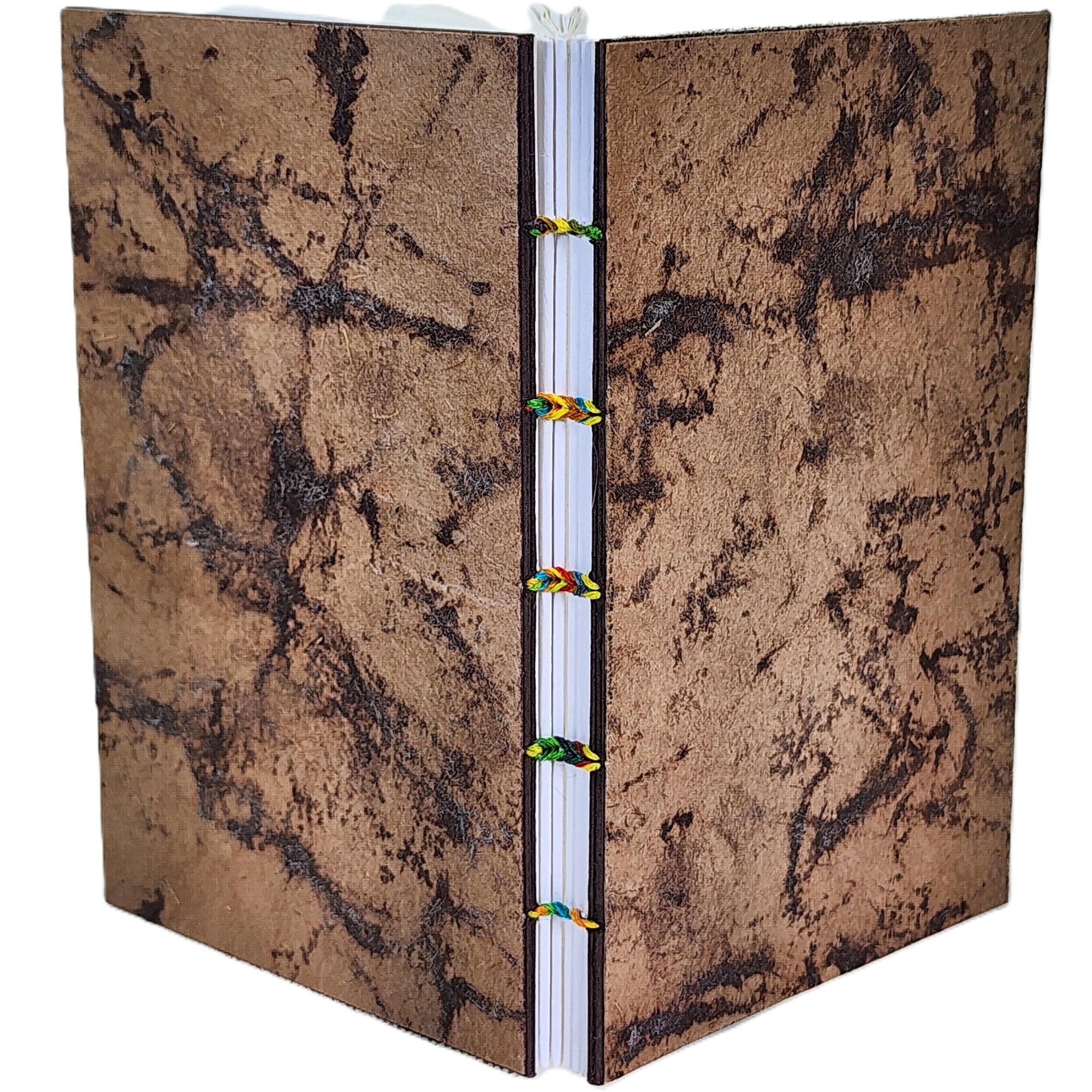Handmade notebook with brown crackle handmade paper on the covers, six signatures white drawing paper, coptic-bound with multicolor thread. ~3.75×6″ · 120 pages.