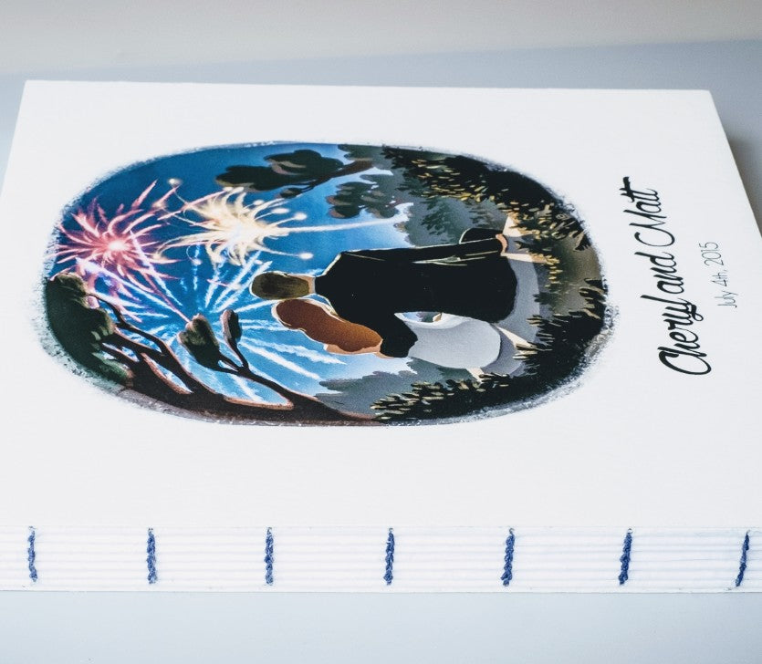 A custom wedding guest book using artwork provided by the client.