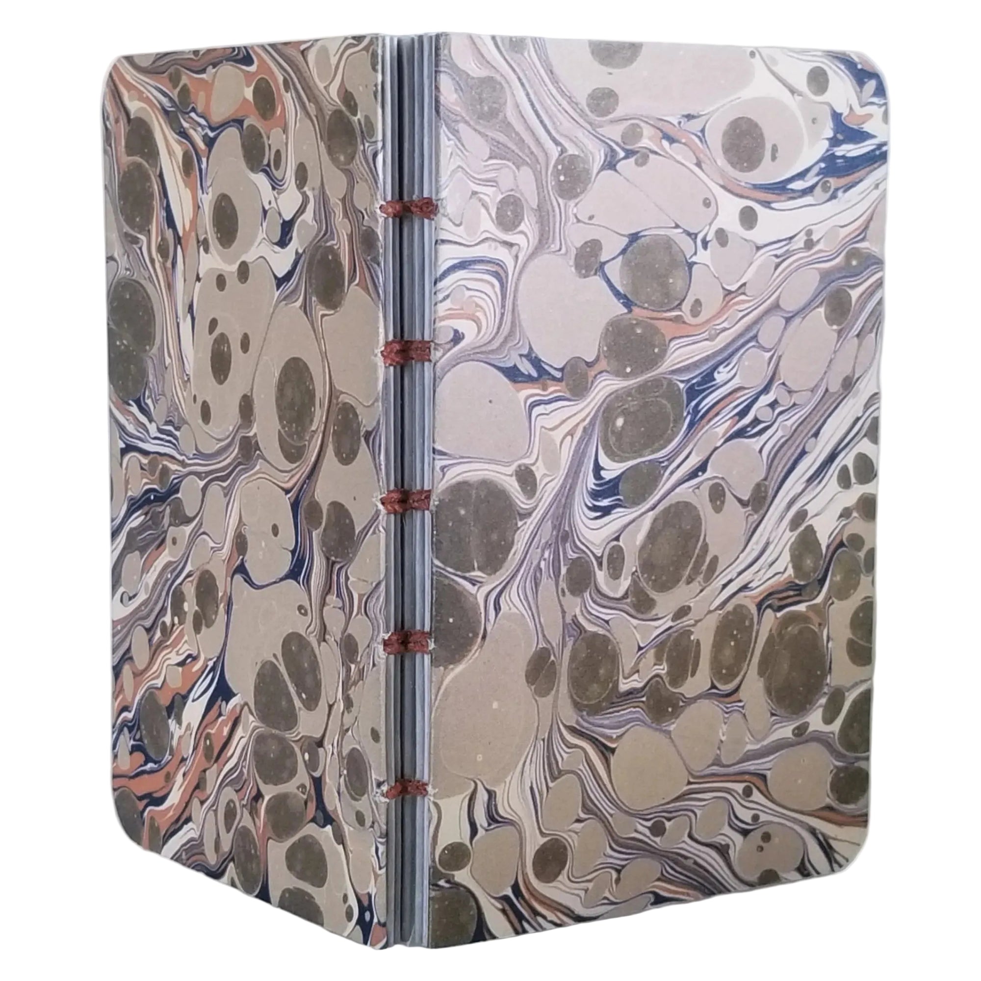 handmade small blank journal with tan and olive printed paper marbling pattern, exposed spine, and rust-colored thread, ~4x5.5" 96 pages, shown on a white background