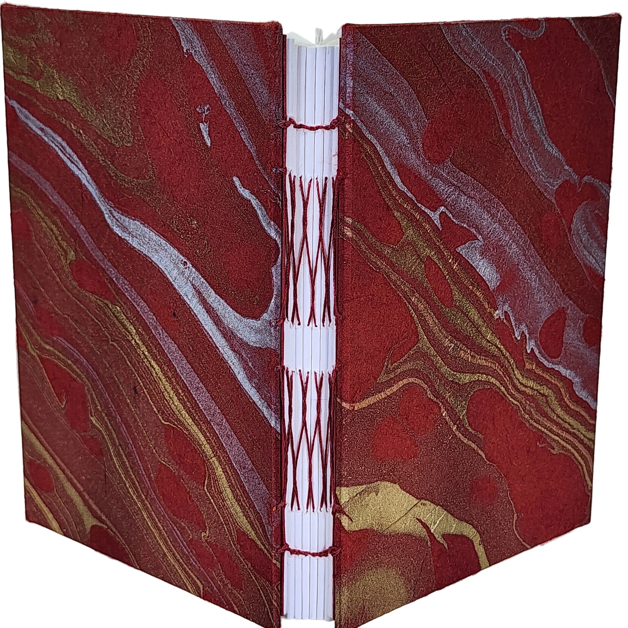 Handmade journal with decorative red and gold marbled covers bound using a french-link stitch.~4.25×6.25" 192 pages.