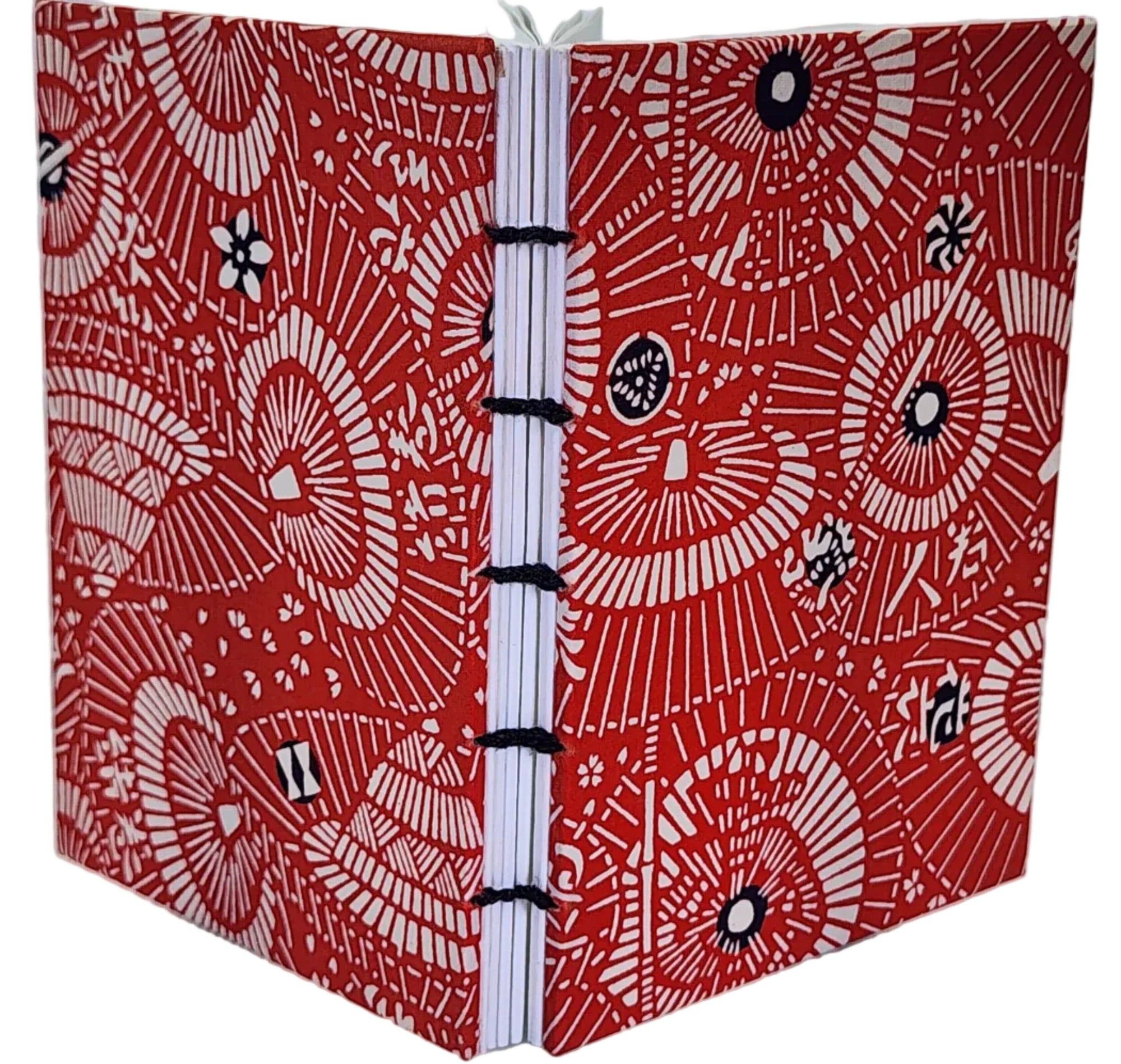 Handmade journal with Japanese Katazome-Shi covers in an abstract pattern of red umbrellas, from the former studio of Mr. Kawakatsu, and coptic bound with black thread