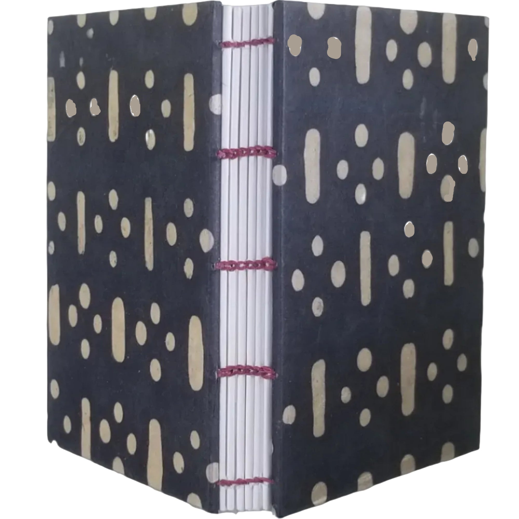 Handmade journal with black covers and a beige geometric pattern of dots and dashes; coptic-bound with waxed linen thread; ~4.25×5.5" and 116 pages.