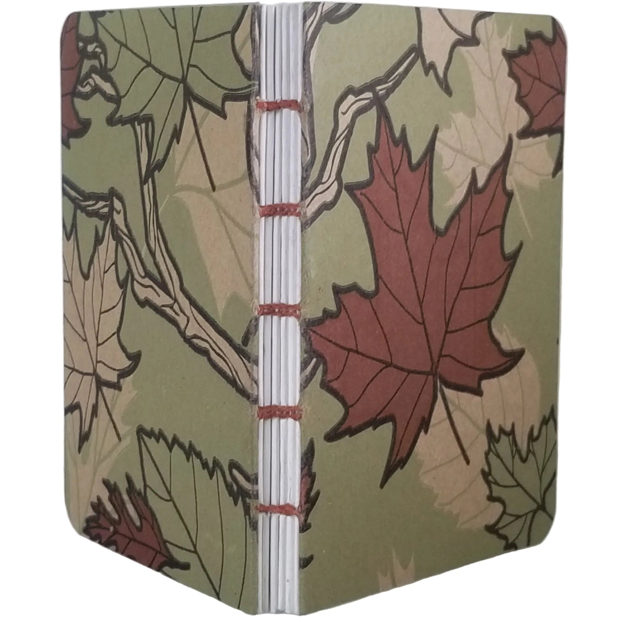 Handmade notebook with leaf pattern coptic-bound with rust-colored linen thread