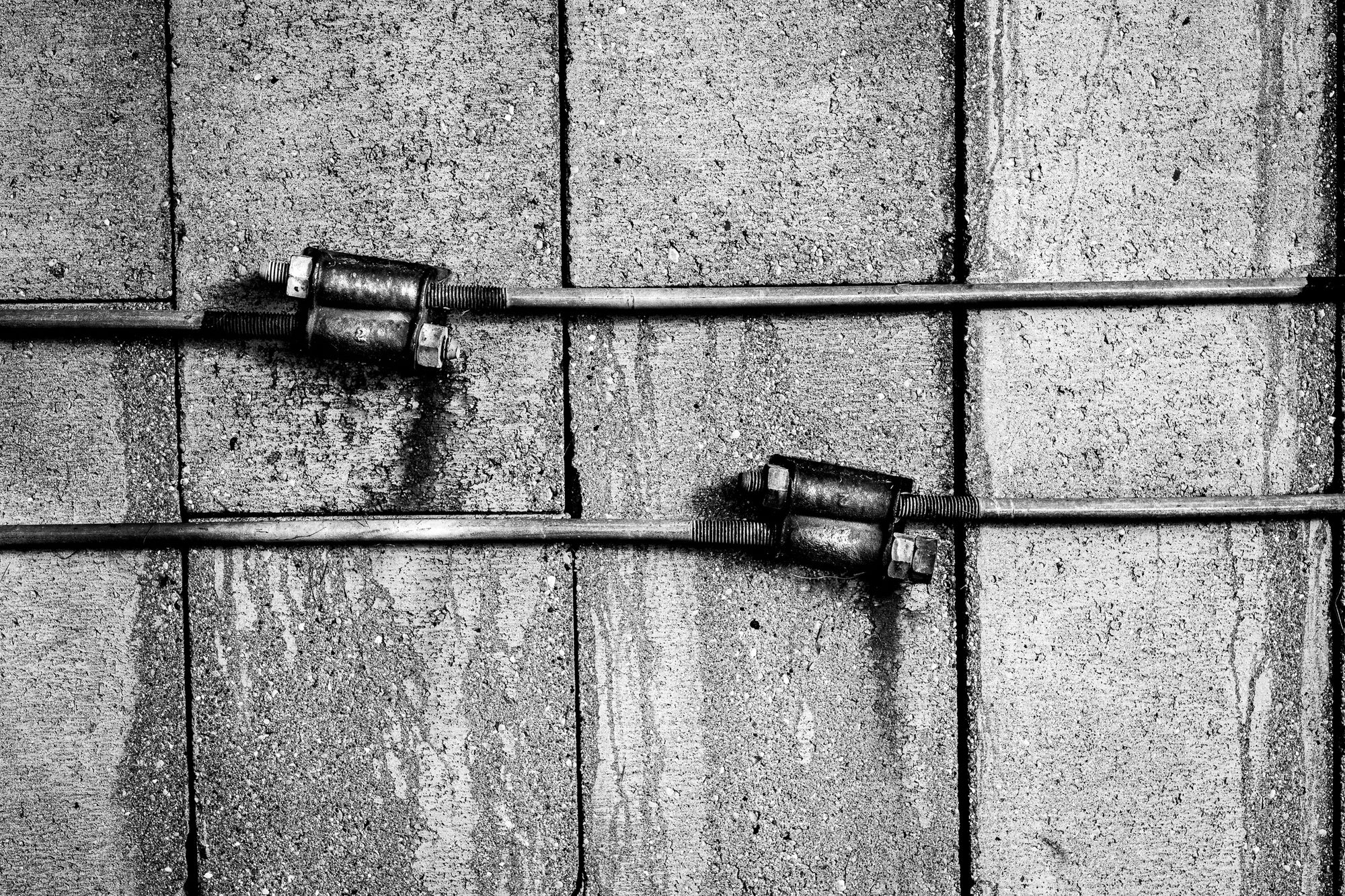 Staves held together by two metal rods with connectors; photographer Rick Graves