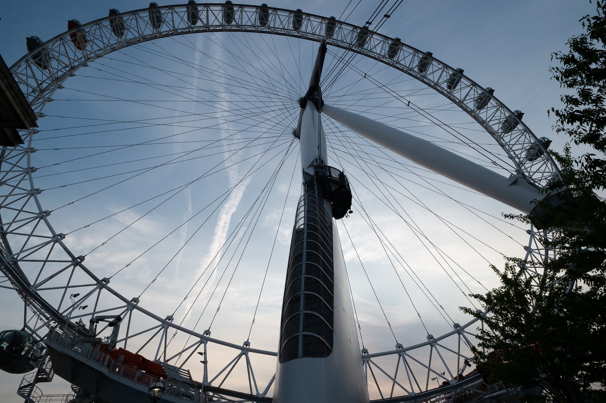 Close-up of the London Eye Ferris wheel against a blue sky