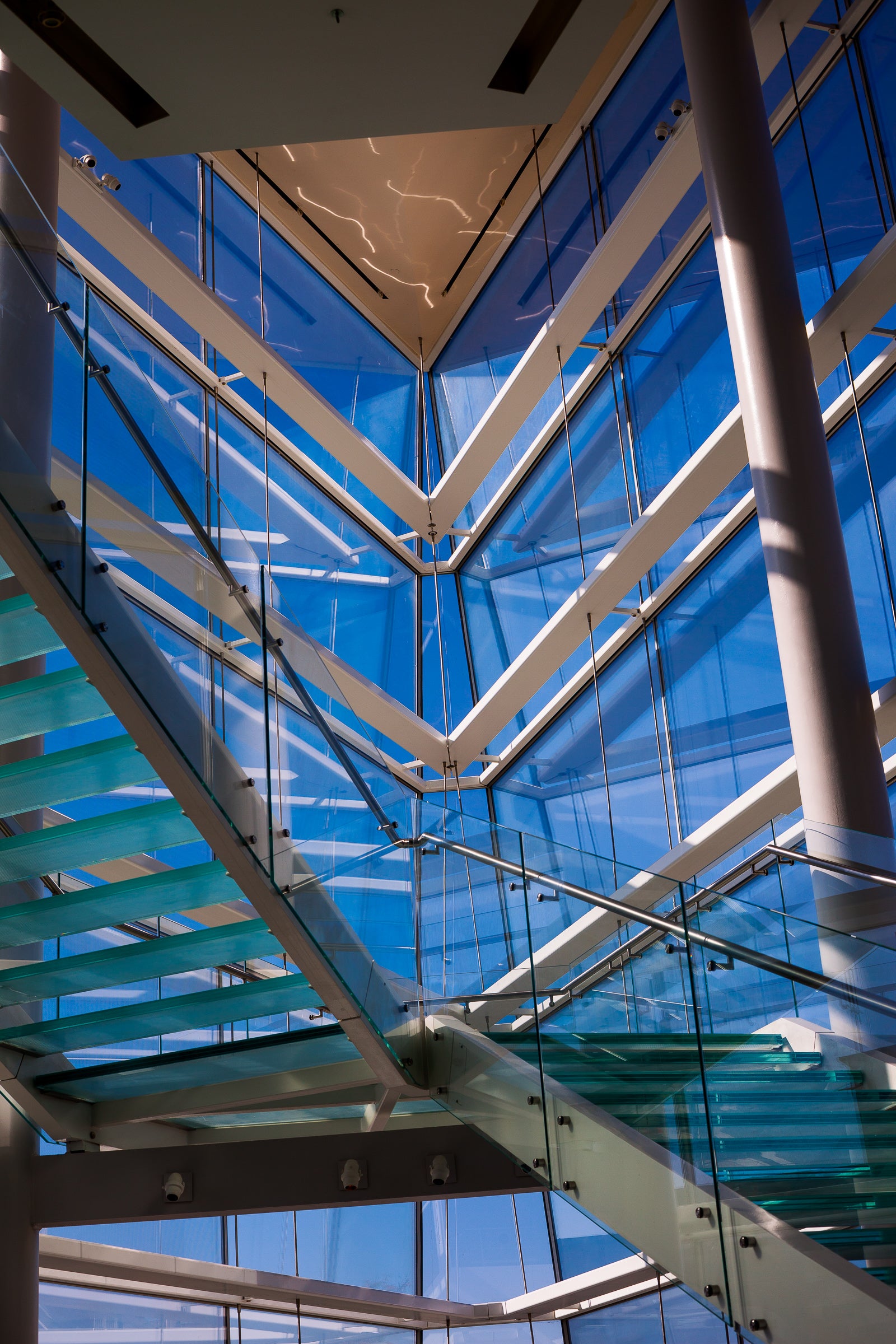 Glass stairway in the modern architectural interior at the MMOCA; photographer Rick Graves