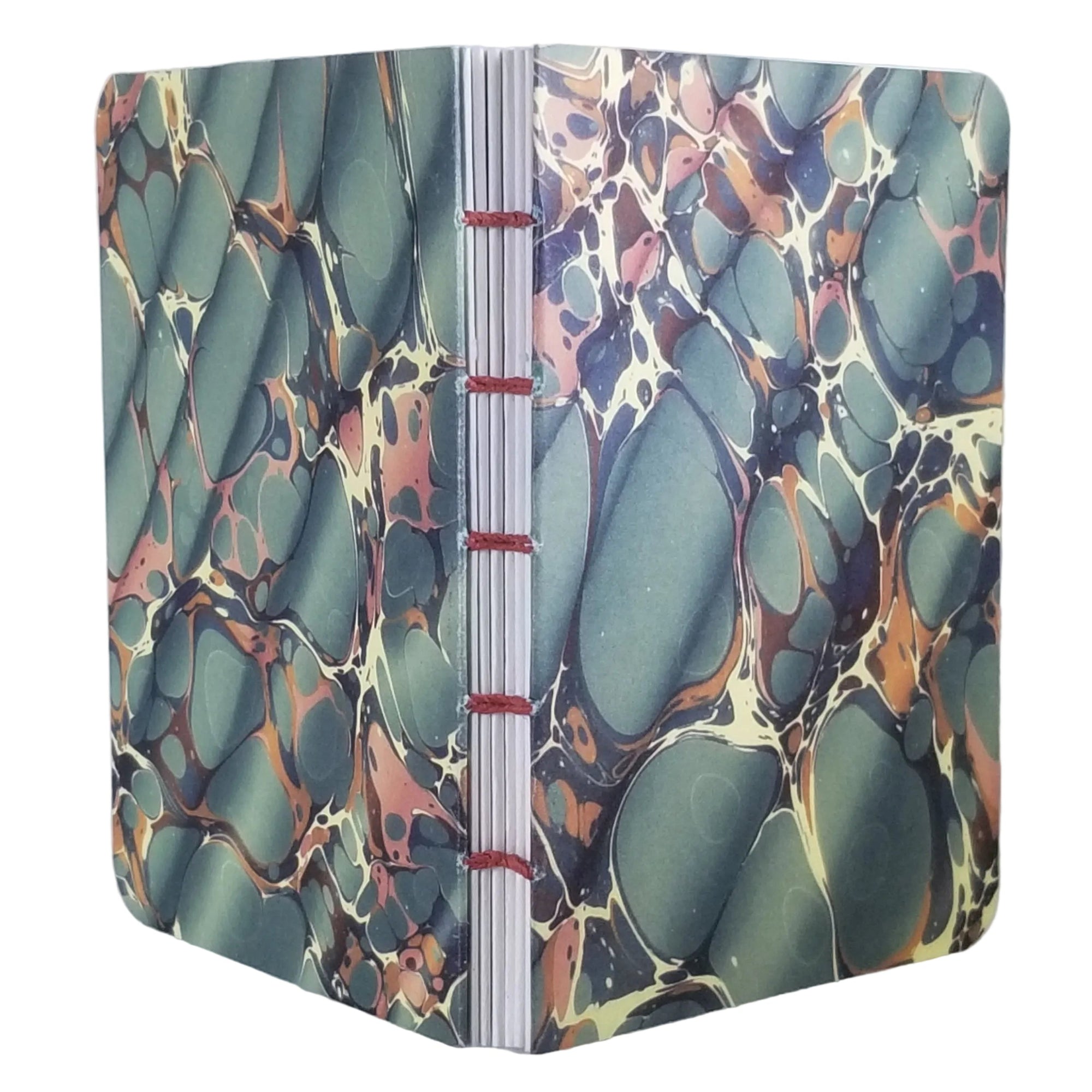 handmade coptic-bound blank notebook with multicolor printed marbled covers in greens, orange, and cream, bound with rust waxed linen thread, ~4x5.5" 96 pages, shown on a white background