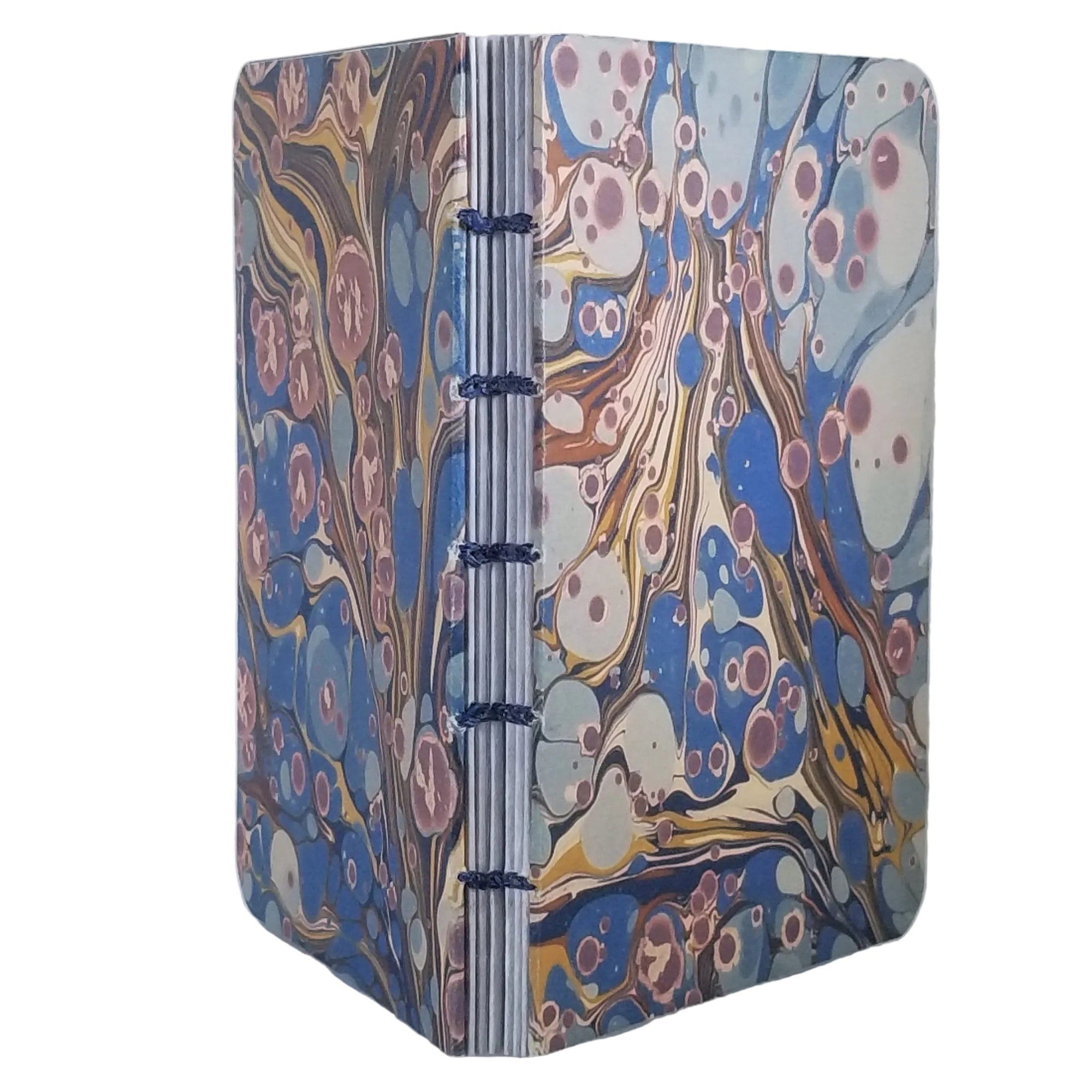 handmade coptic-bound blank notebook with multicolor printed marbled covers in blues, gold, and rust, bound with blue waxed linen thread, ~4x5.5" 96 pages, shown on a white background