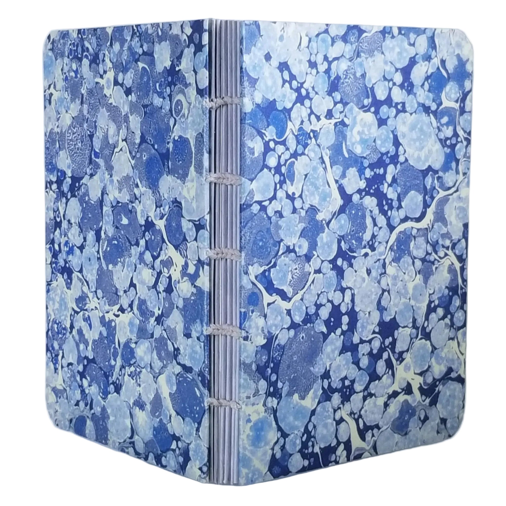 handmade coptic-bound blank notebook with blue and light blue printed marbled covers and grey waxed linen thread, ~4x5.5" 96 pages, shown on a white background