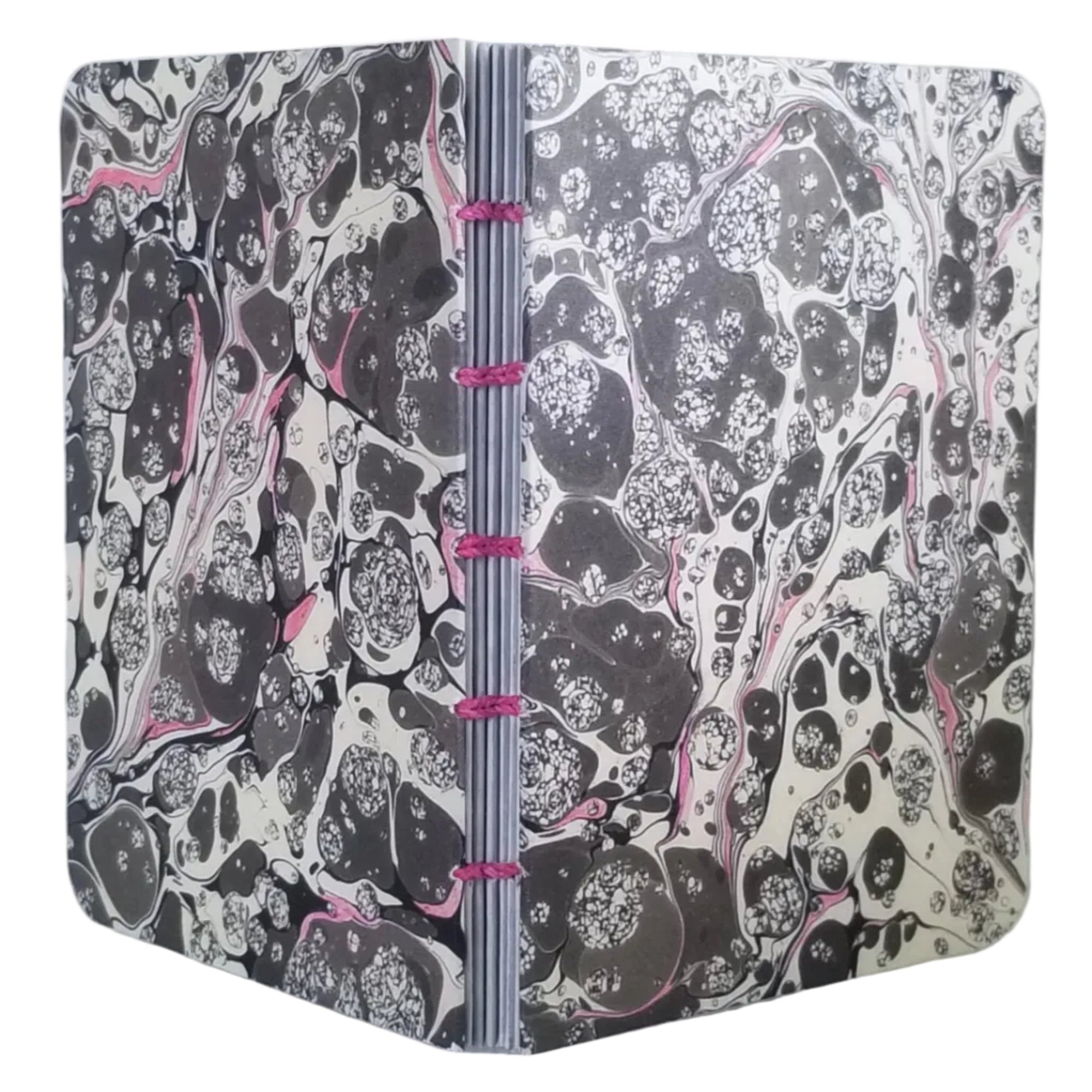 handmade small blank journal with covers of taupe and cream-colored marbling pattern, exposed spine, and hot-pink thread, ~4x5.5" 96 pages, shown on a white background