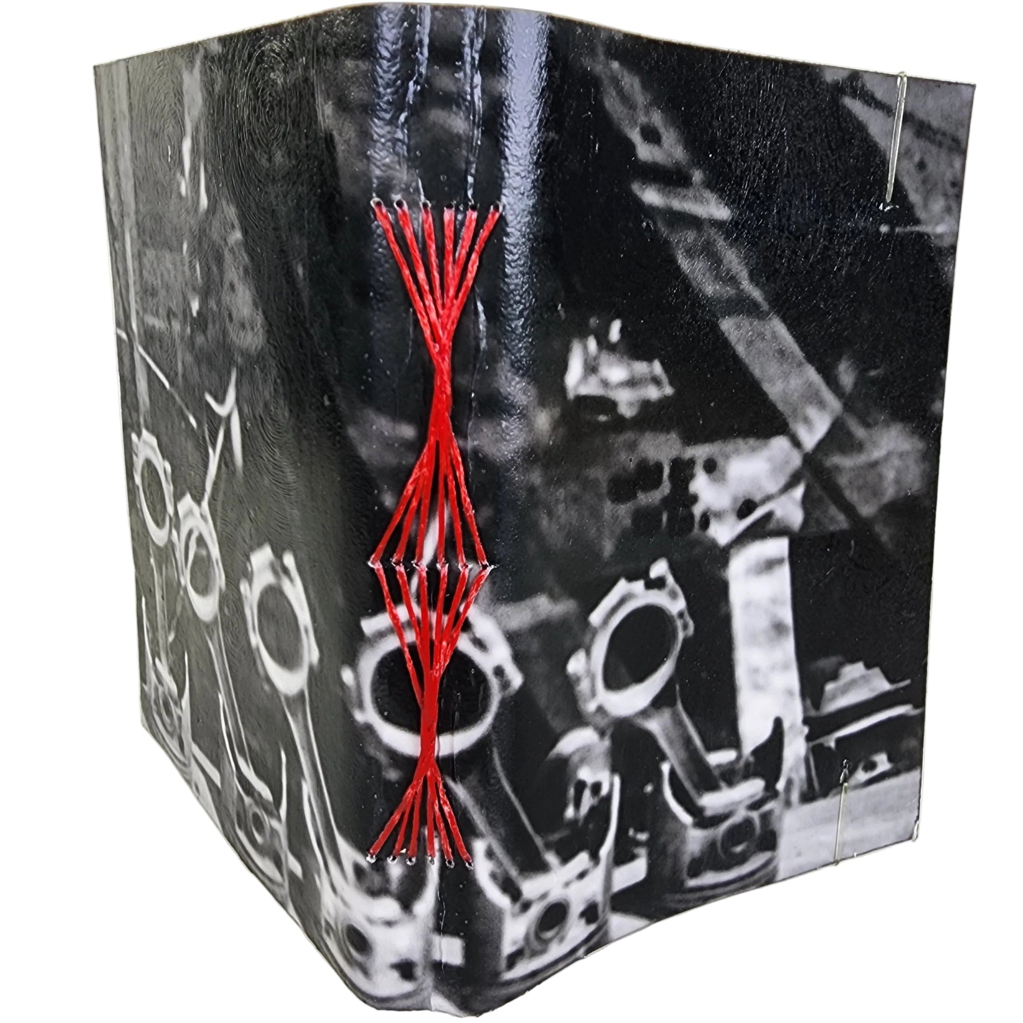 0327 photowrap journal, Cadillac connecting rods / engine parts in window, red butterfly longstitch binding, coated cover, clear elastic closure