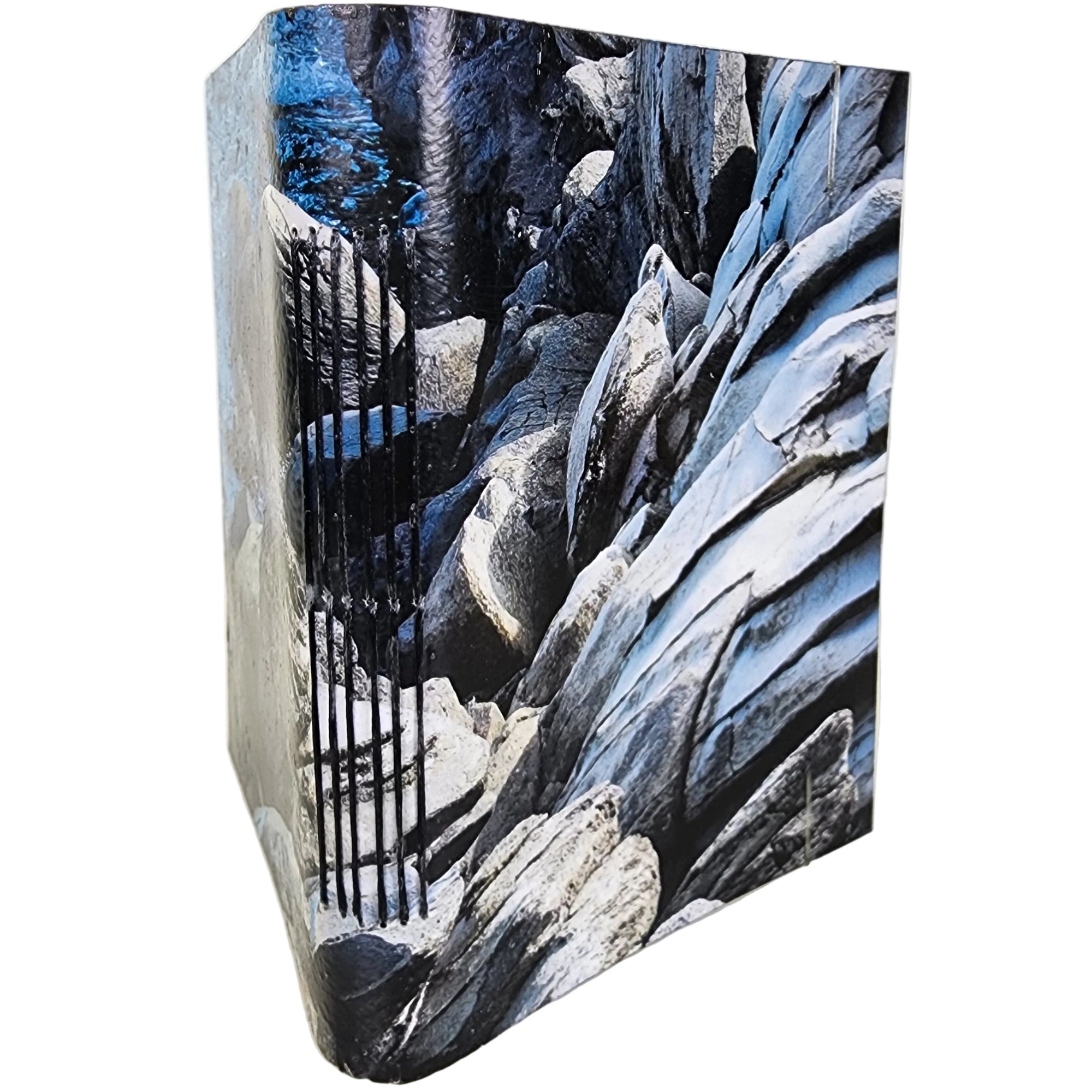 0347 photowrap journal, weather-worn shoreline rocks; black longstitch binding, coated cover, clear elastic closure