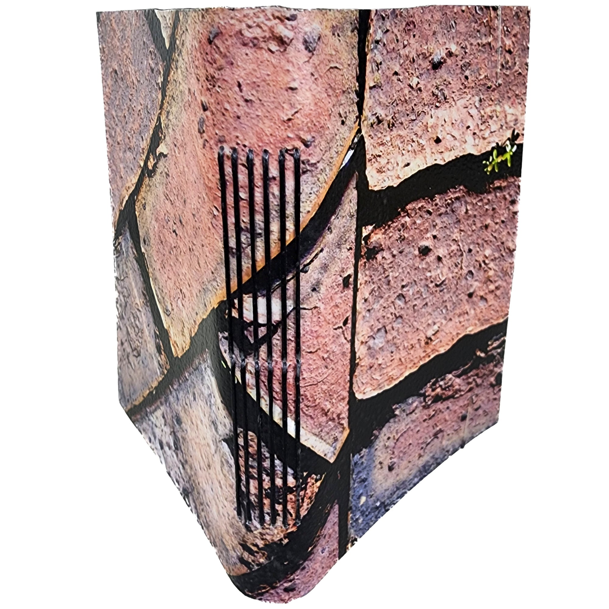 small book with cover photo by Rick Graves: an old brick sidewalk with a touch of greenery growing between the pavers; bound with butterfly longstitch-using black polyester thread; six signatures of white paper with elastic closure; ~4x5.5" 120 pages. 