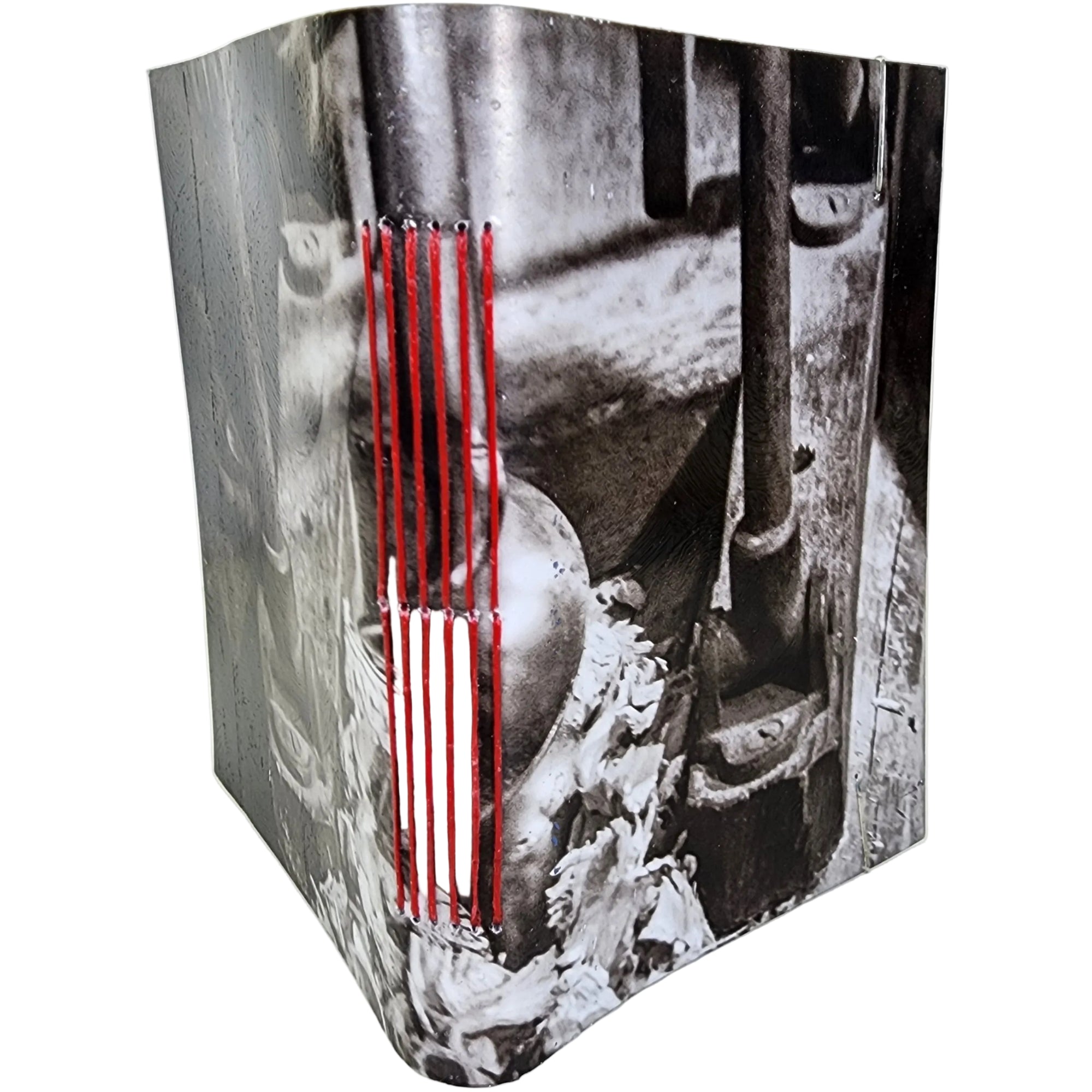 0379 photowrap journal, cover image is of hand tools and wood shavings, red longstitch binding, coated cover, clear elastic closure