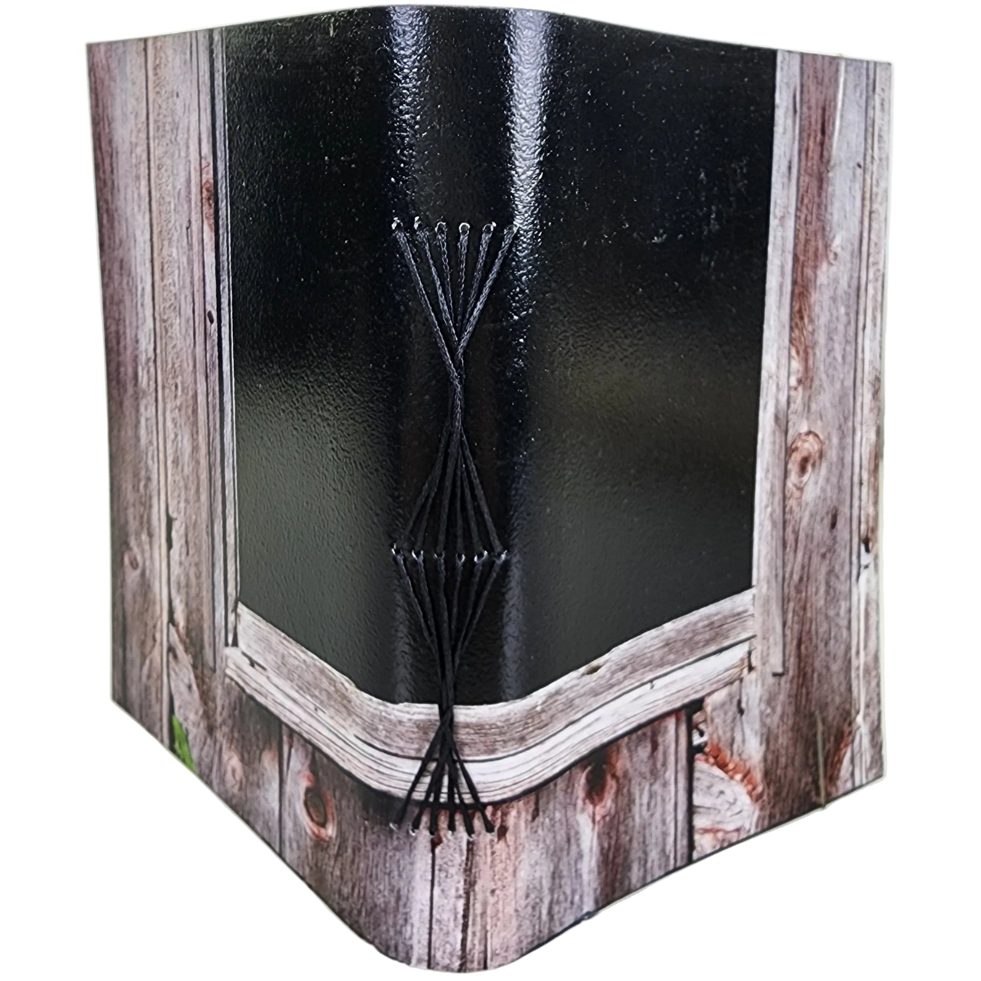 0544 photowrap journal, barn window black void in a faded wood wall, black butterfly longstitch binding, coated cover, clear elastic closure