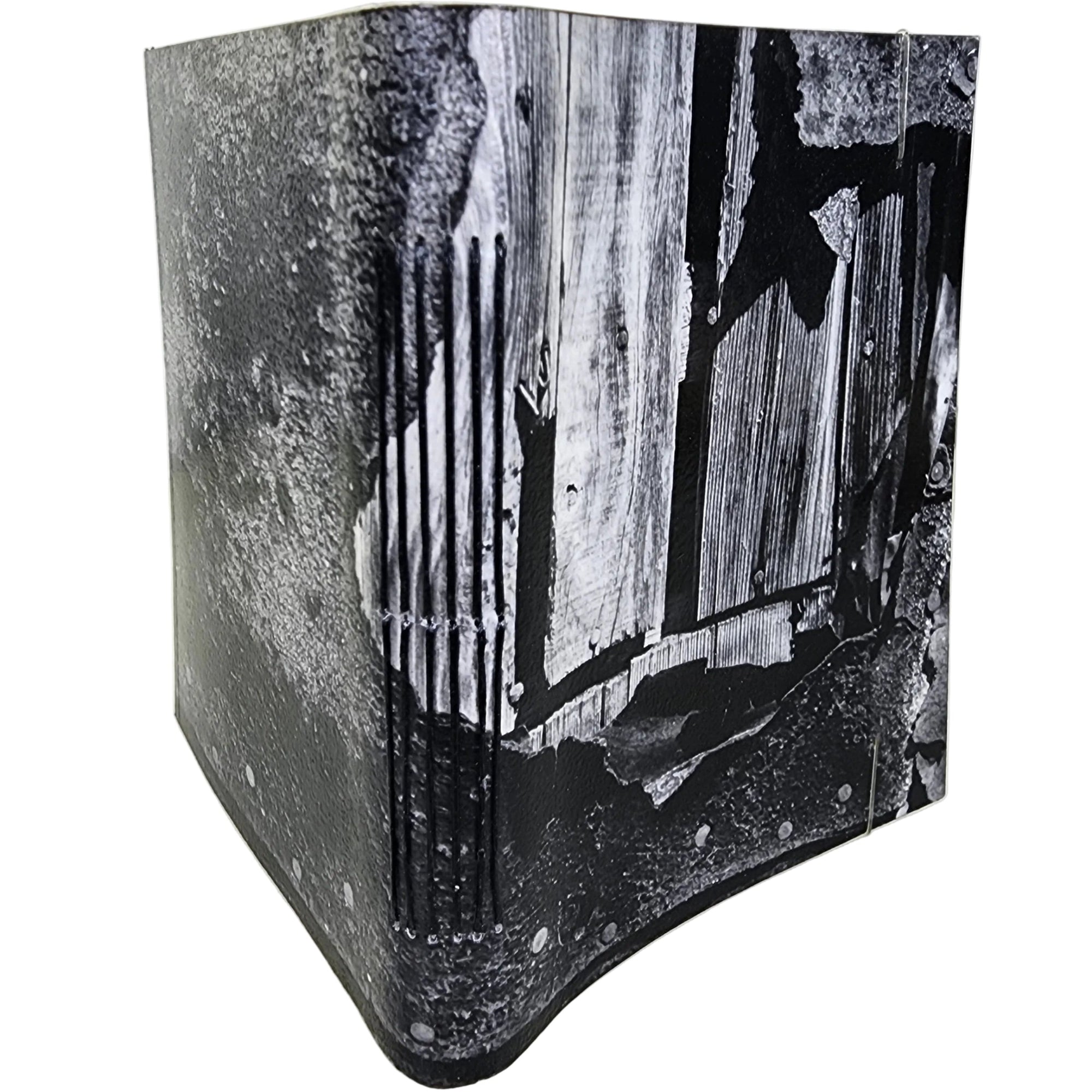 0371 - photowrap journal with cover image of irregular wood boards covered with peeling tarpaper; black longstitch binding 120 pages